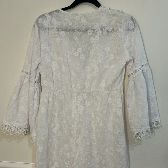Rafaela D’Angelo. White boho or beach maxi dress.